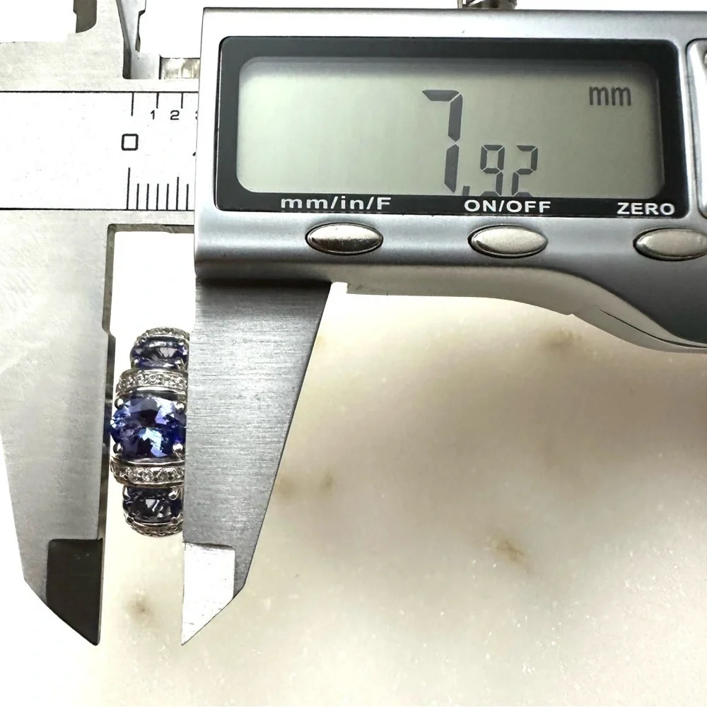 3 Stone Blue Tanzanite | White Zircon Rhodium over Sterling Silver Ring 2.44ctw